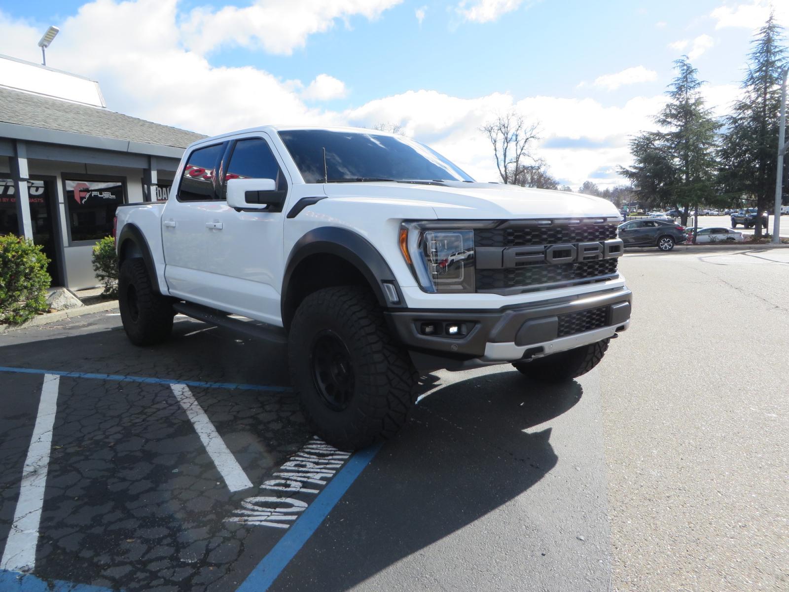 2023 White /BLACK Ford F-150 Raptor SuperCrew 4WD (1FTFW1RG6PF) with an 3.5 V6 engine, 6A transmission, located at 2630 Grass Valley Highway, Auburn, CA, 95603, (530) 508-5100, 38.937893, -121.095482 - Raptor sitting on Eibach front and rear springs, 37" Nitto Ridge Grappler tires, 17" Method NV wheels, and window tint. - Photo #2